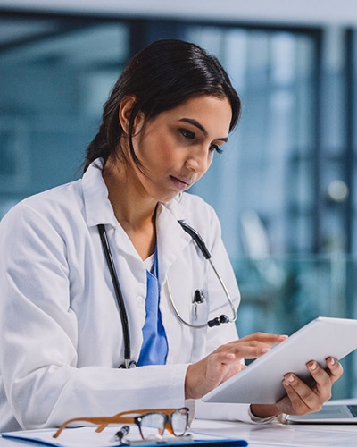 Female Doctor on a Tablet