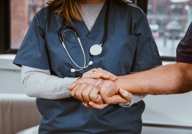 nurse-helping-patient